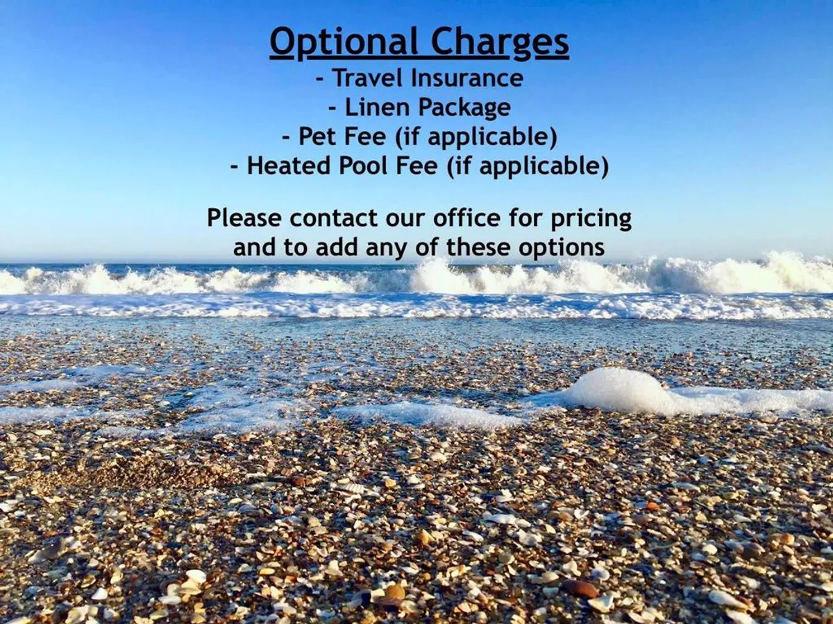 An expansive view of the beach with soft sand, gentle waves rolling in, and a wide, open sky above. There are no crowds, just pure shoreline, evoking a sense of tranquility and escape. The scene hints at both daytime play and peaceful sunset walks.